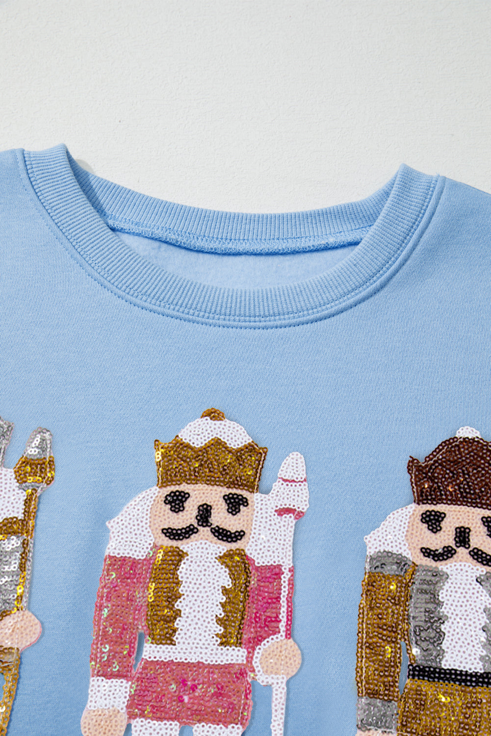 Beau Blue Sequin Nutcracker Textured Sleeve Patchwork Color Block Sweatshirt