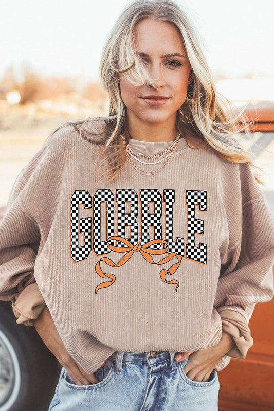 Apricot Twisted Ribbed Texture Checkered GOBBLE Bow Print Baggy Sweatshirt