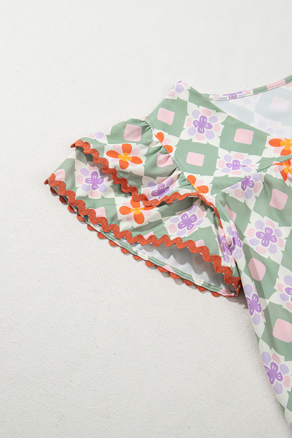 Green Geometric Floral Print Layered Flutter Sleeve V Neck Ric Rac Trim Blouse