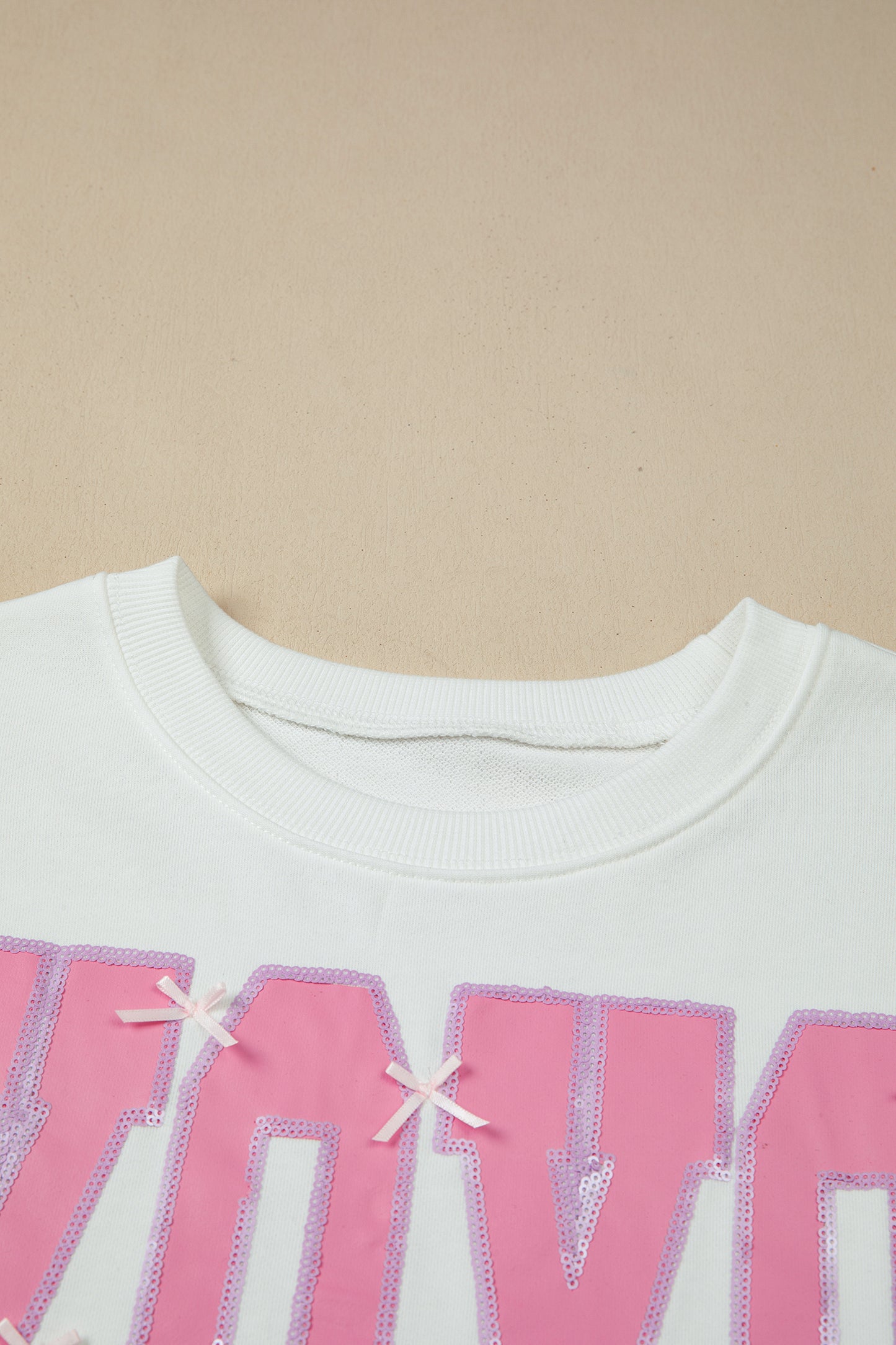 Pink Bow Sequin XOXO Letter Graphic Exposed Seam Baggy Sweatshirt