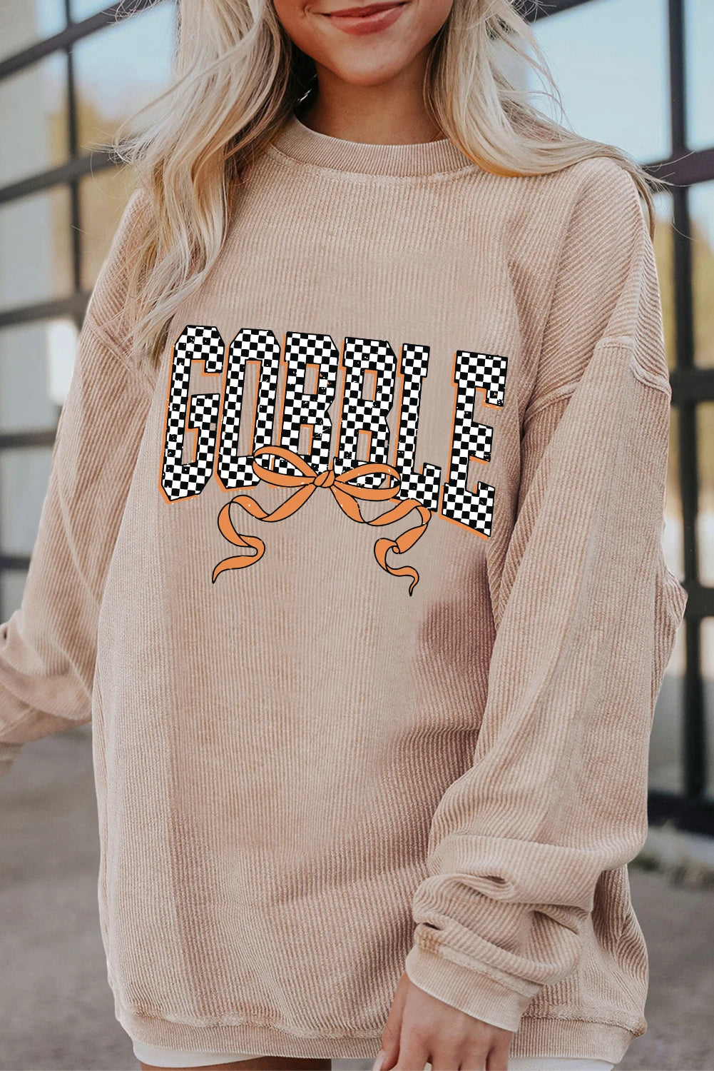 Apricot Twisted Ribbed Texture Checkered GOBBLE Bow Print Baggy Sweatshirt