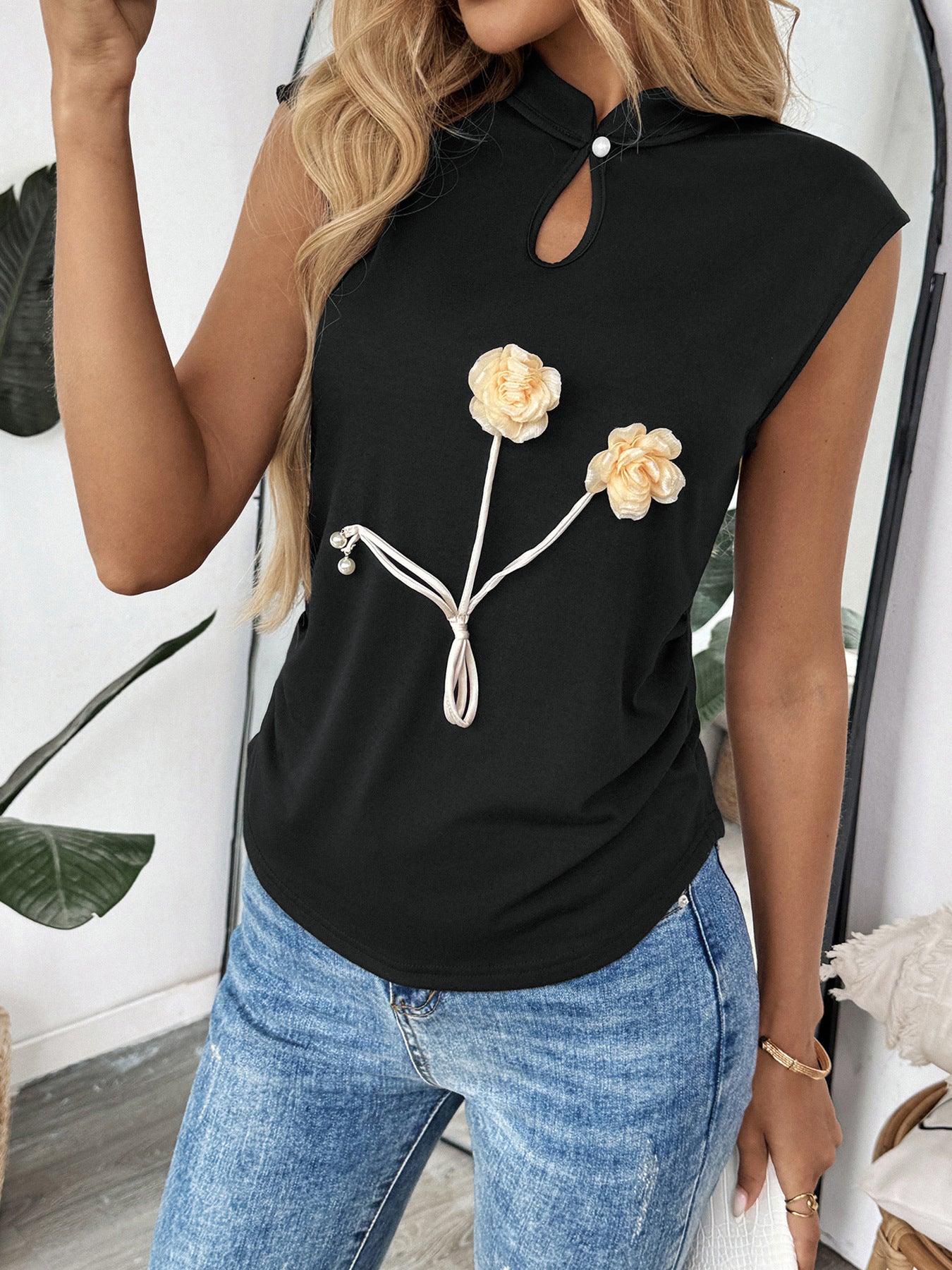 Unique Black Sleeveless Top with Floral Detailing and Keyhole Closure
