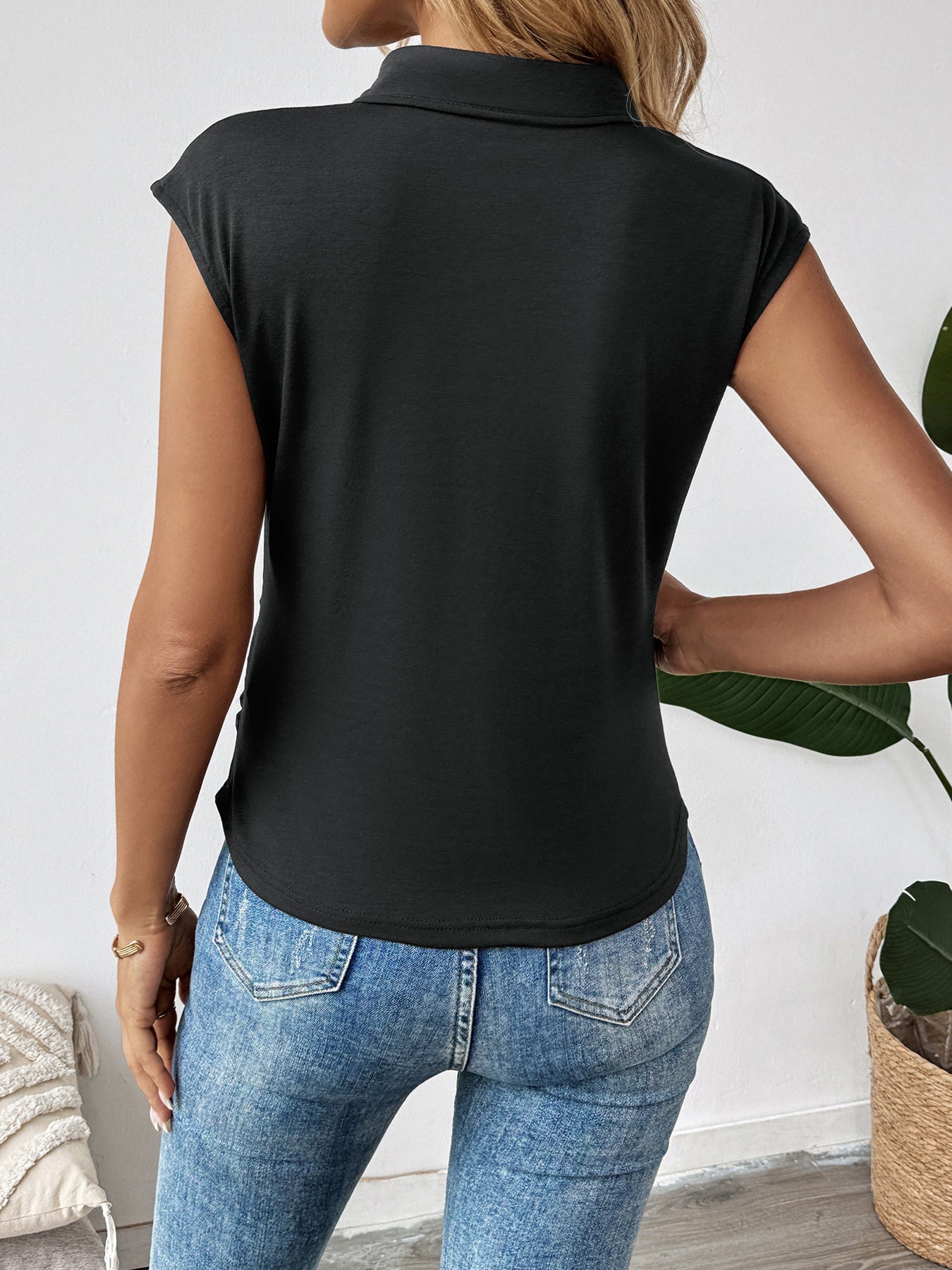 Unique Black Sleeveless Top with Floral Detailing and Keyhole Closure