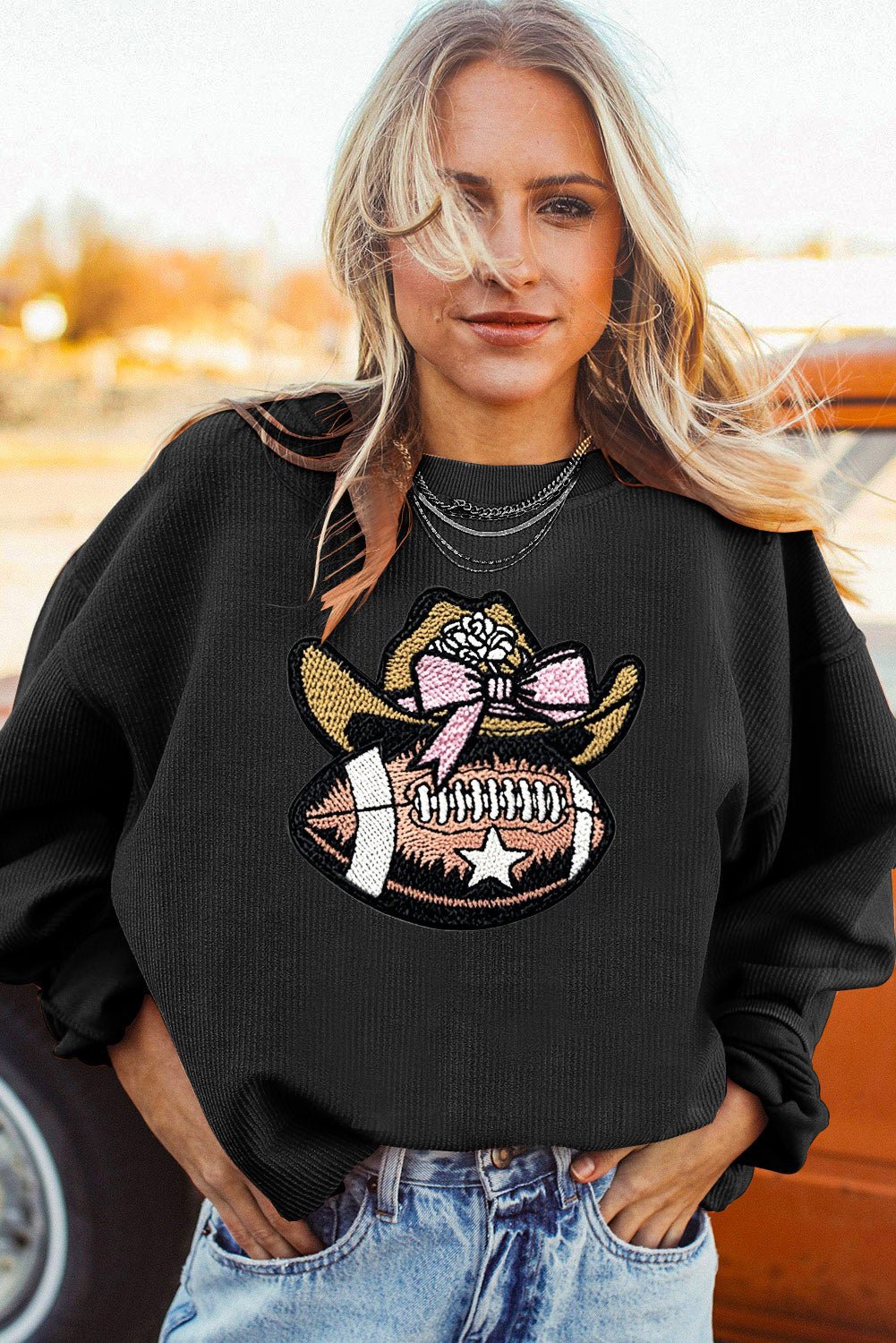 Oversized Ribbed Sweatshirt with Cowgirl Football Graphic