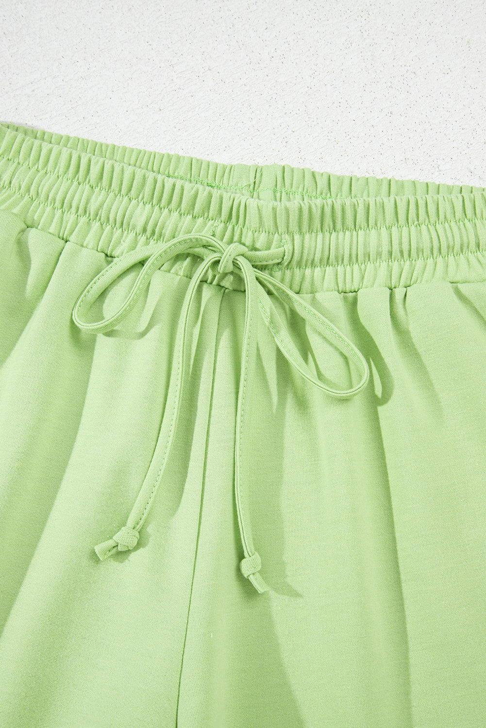 Meadow Mist Green Solid Loose V Neck Half Sleeve Tee and Shorts