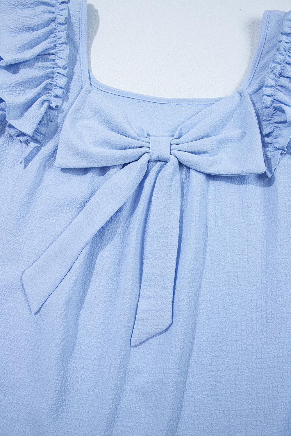 Gossamer Pink Textured Bow Knot Frilled Butterfly Sleeve Blouse