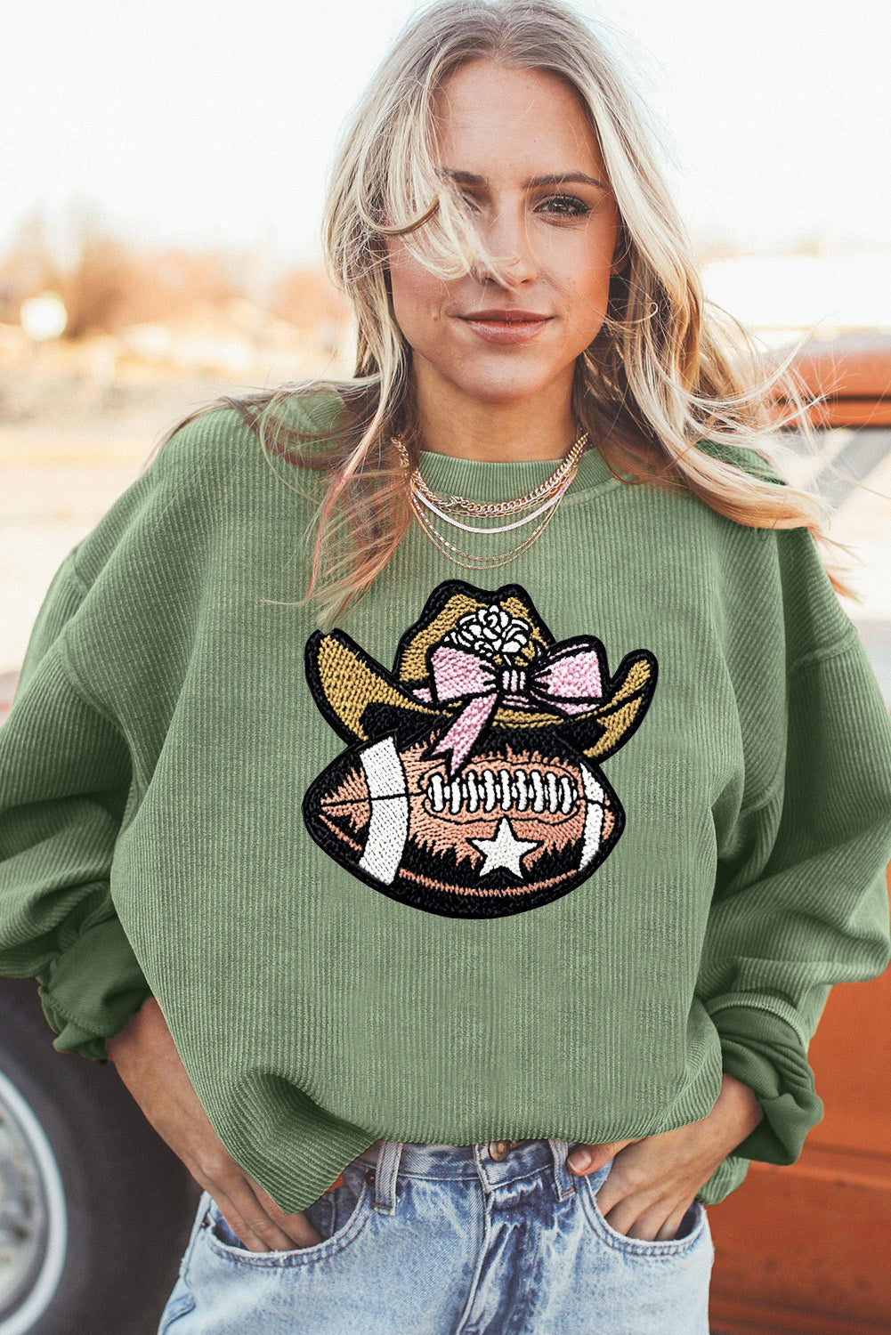Oversized Ribbed Sweatshirt with Cowgirl Football Graphic