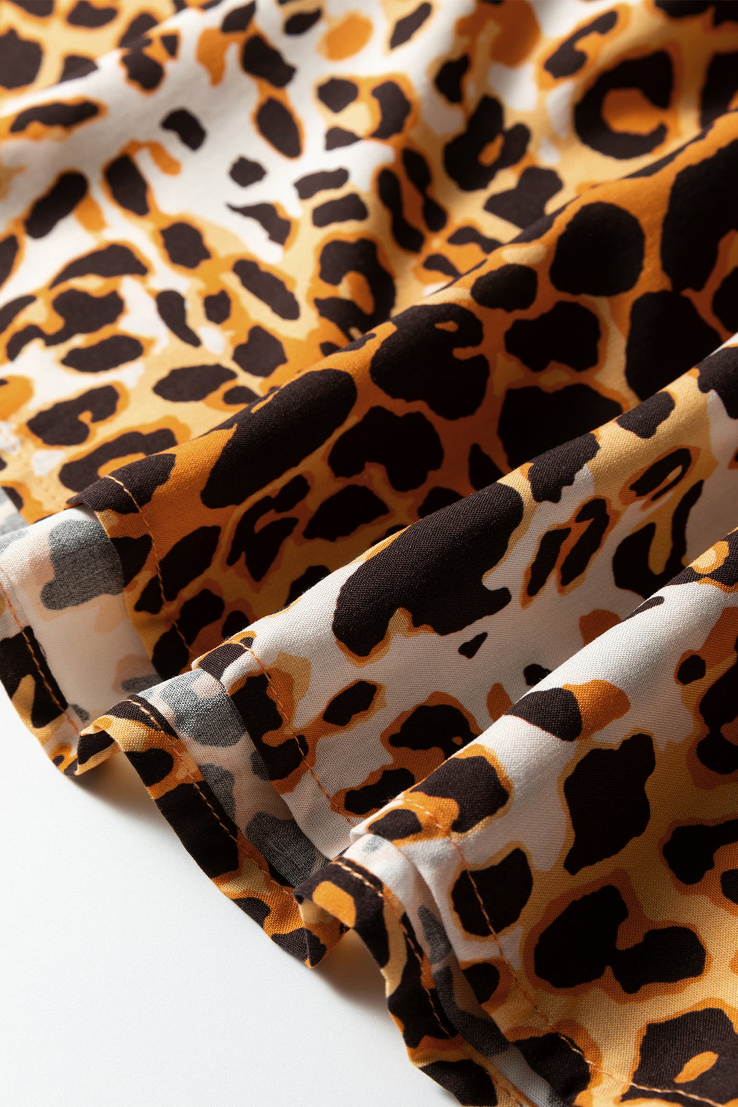 Leopard Print Short Puff Sleeve Slit Neck Babydoll Blouse