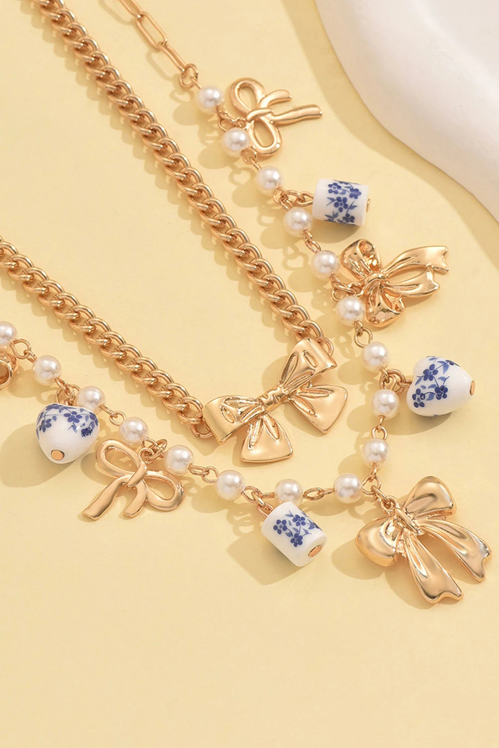 Gold Plated Bow Chain Porcelain Pearls Embellished 2pcs Necklace Set