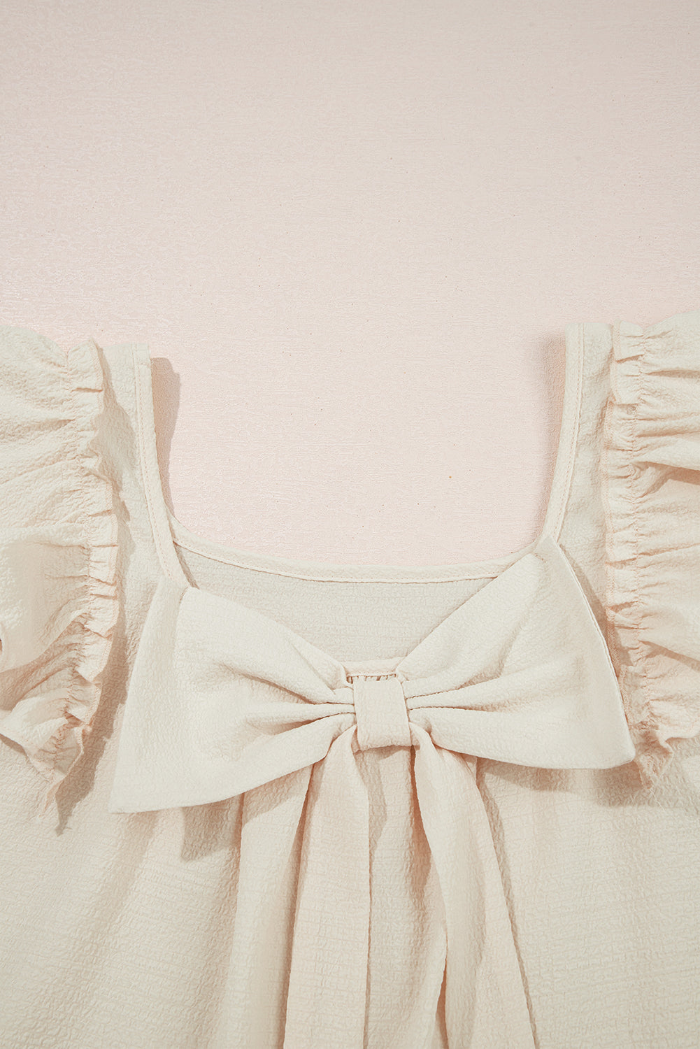 Gossamer Pink Textured Bow Knot Frilled Butterfly Sleeve Blouse